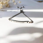 Who Rescued Who Bar Bracelet